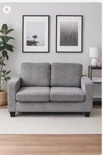 Lucy grey fabric two-seater in styled living room
