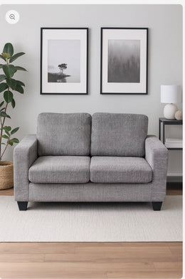 Lucy grey fabric two-seater in styled living room